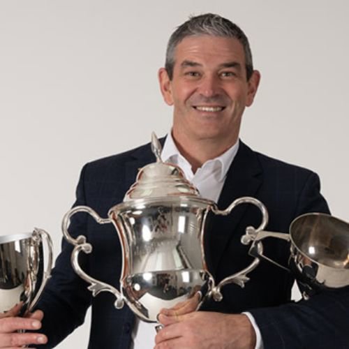 Mark McGoldrick - Harcourts logo