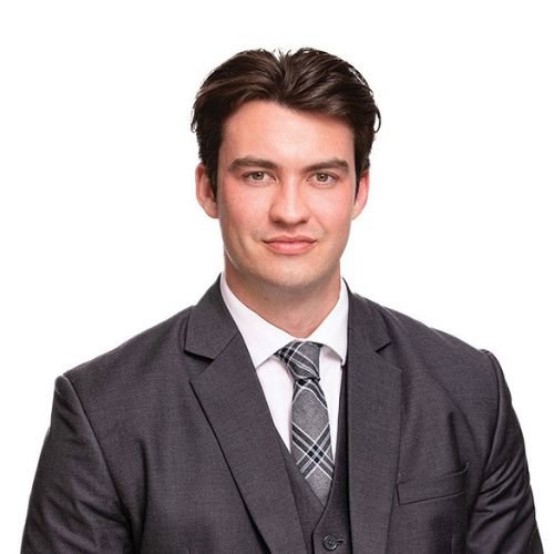 Riley Malzard - Harcourts logo